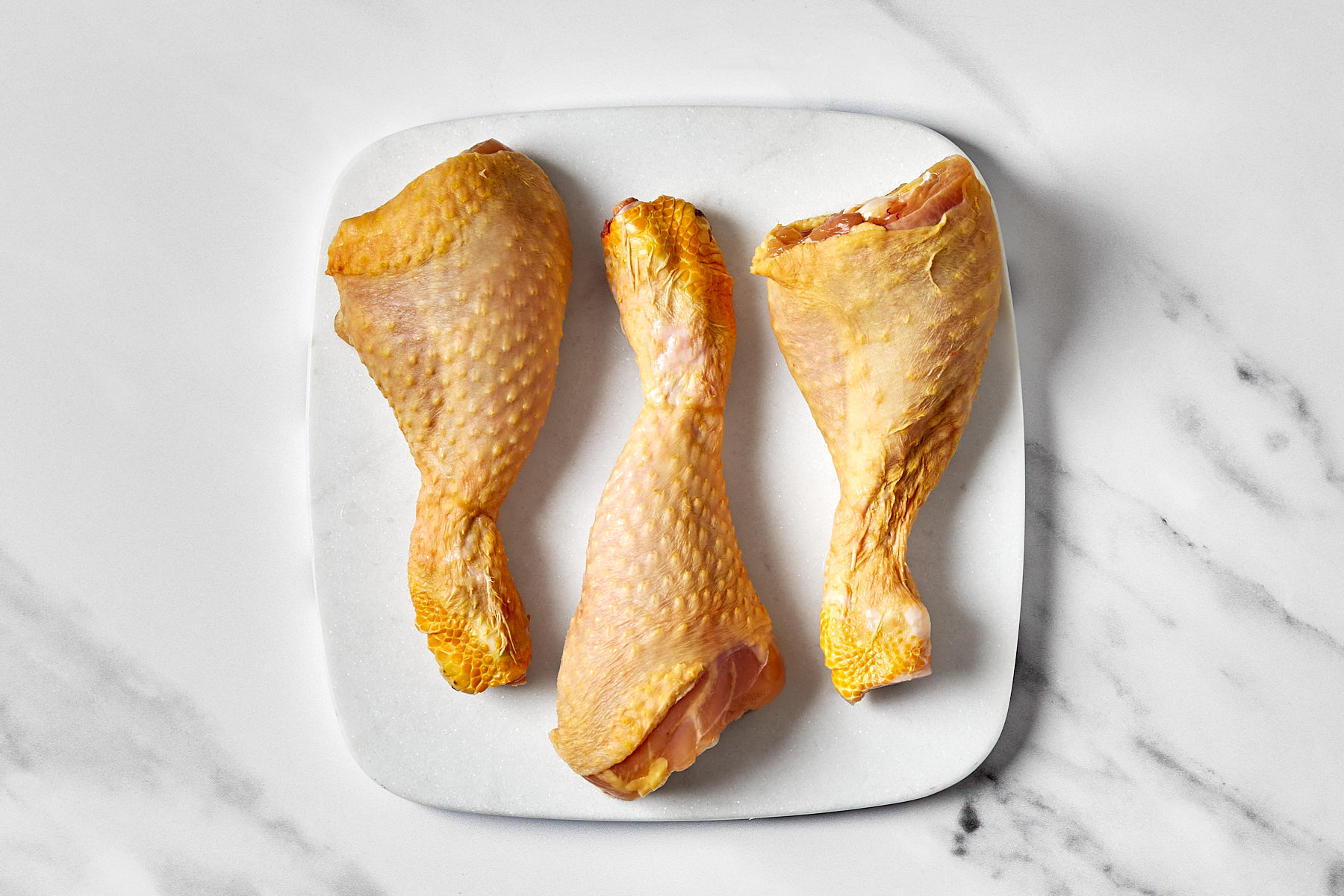 Muslos de pollo de corral