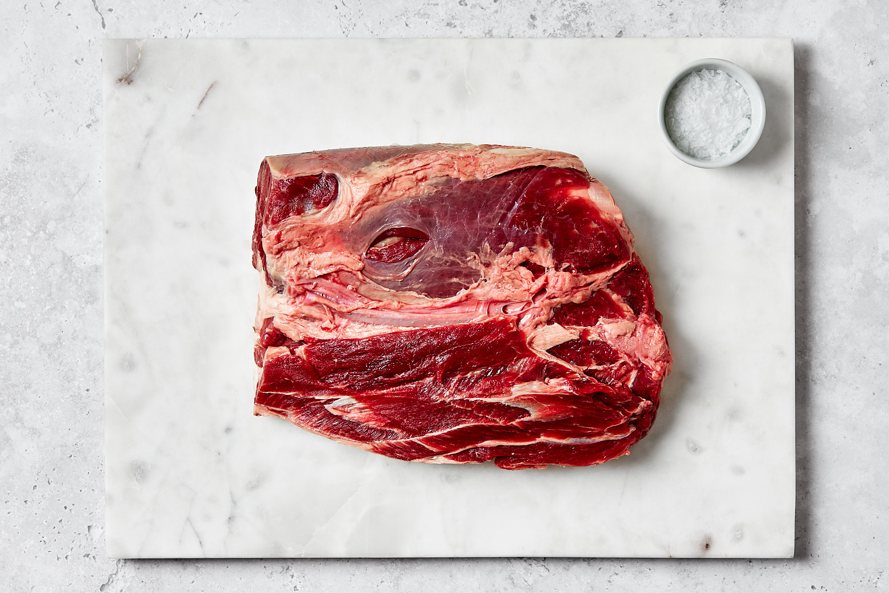 Aguja de cerdo deshuesada. Pieza entera para asar (2 kg aprox.)